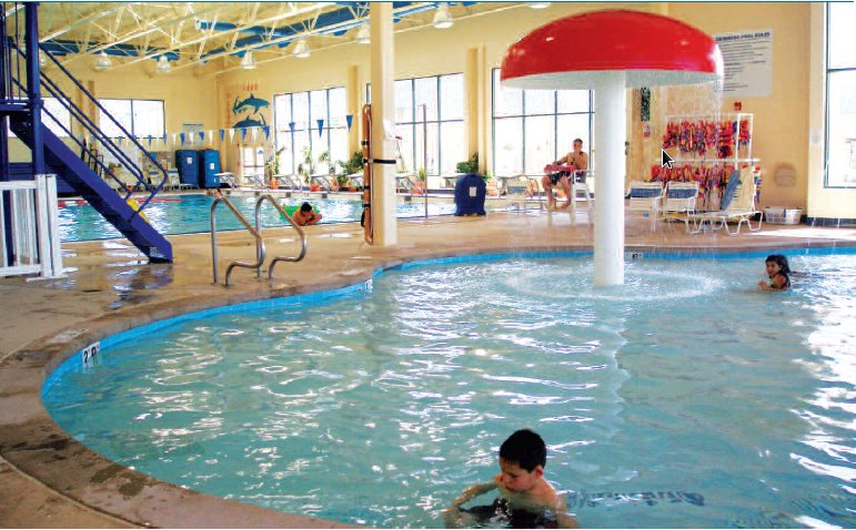 Photo of a public indoor pool environment.